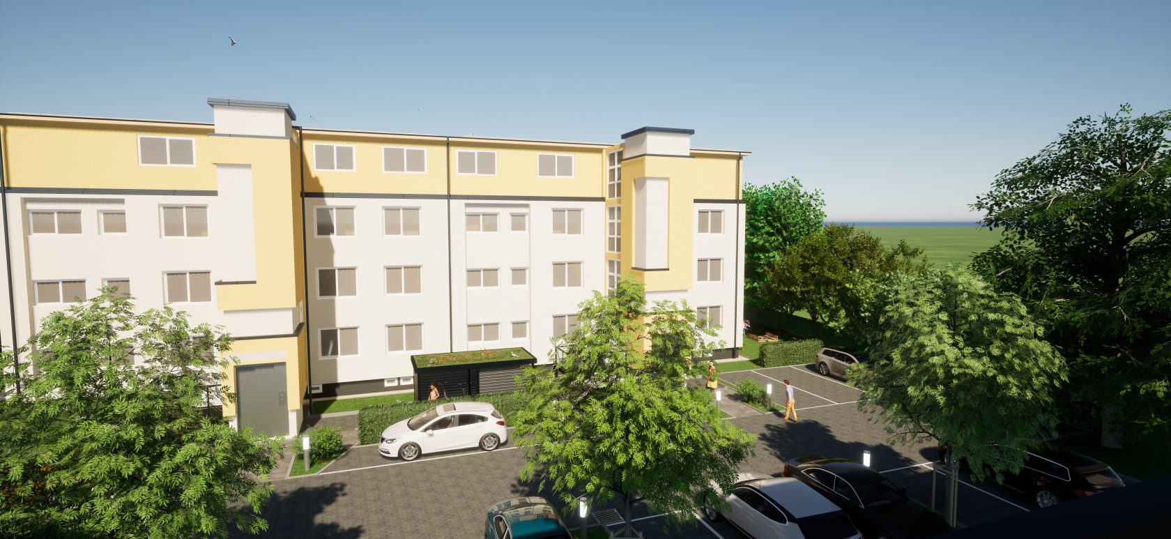 Fassade Mehrfamilienhaus mit Parkplätzen