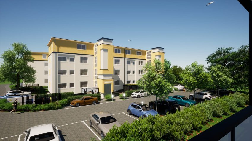 Fassade Mehrfamilienhaus mit Parkplätzen