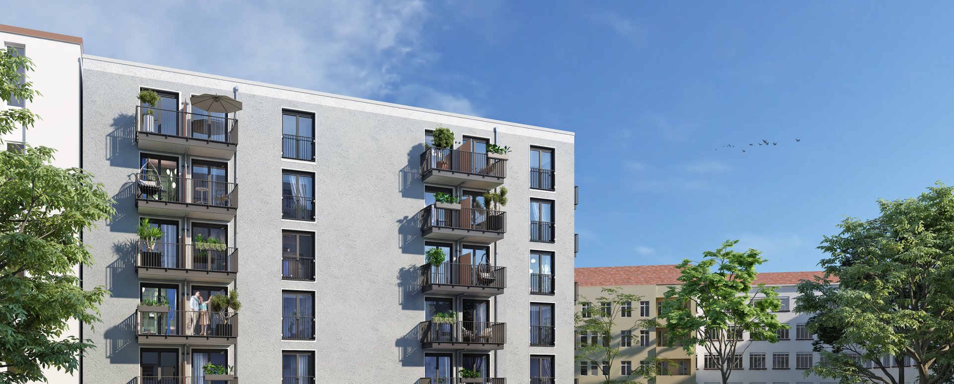 Fassade Mehrfamilienhaus mit Balkonen