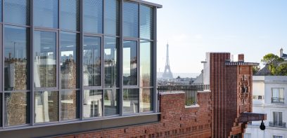 Covivio Headquarter l'Atelier mit Blick auf den Eifelturm