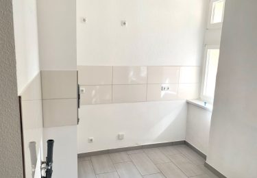 Küche mit Fliesenspiegel