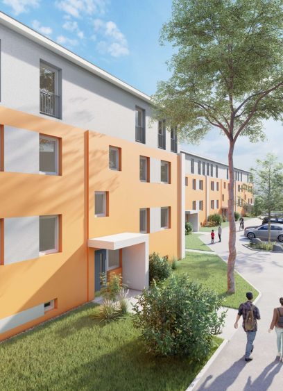 Fassade Mehrfamilienhaus mit Parkplätzen