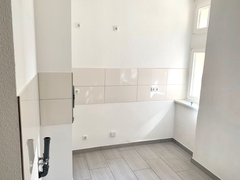 Küche mit Fliesenspiegel