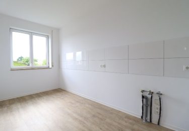 Küche mit Fliesenspiegel und WM-Anschluss